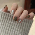 silver/ grey glossy reusable press-on nails by Nailed It
