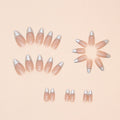Set of beige nail extensions with silver tips on a beige background by Nailed It