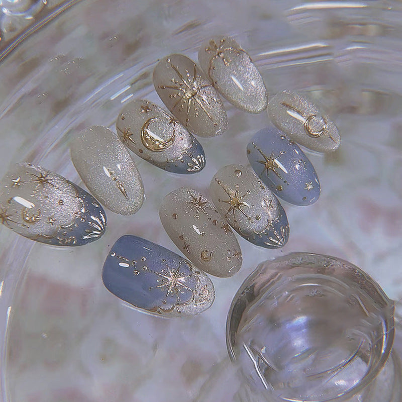 Silver star glossy reusable press-on nails by Nailed It