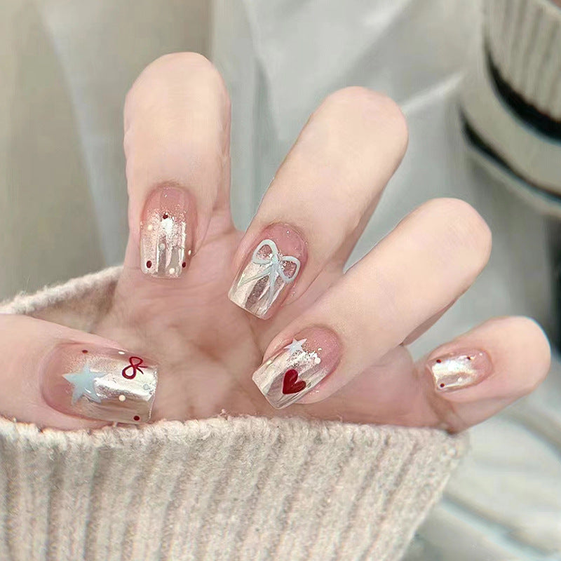 silver cute reusable press-on nails by Nailed It
