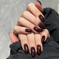 Dark red glossy reusable press-on nails by Nailed It
