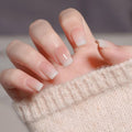 Pink/ white/ french-tip reusable press-on nails by Nailed It

