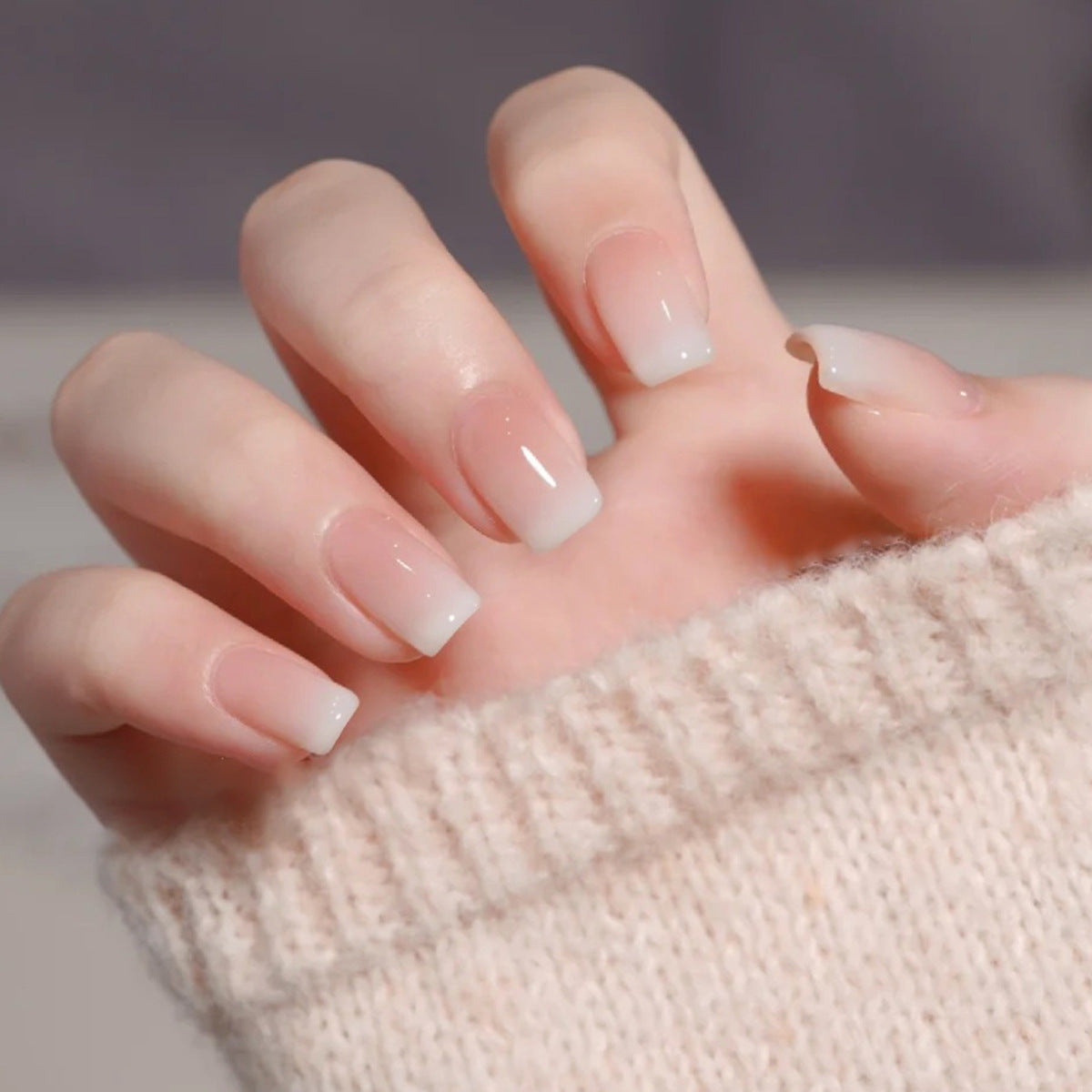 Pink/ white/ french-tip reusable press-on nails by Nailed It
