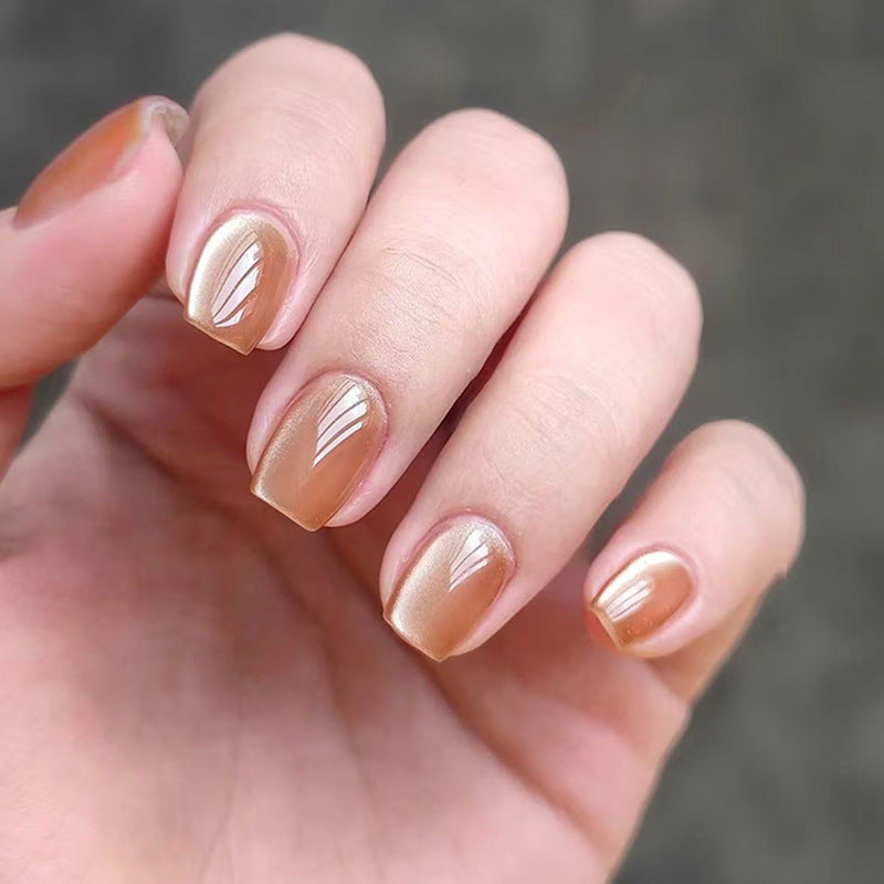 Amber/ orange glossy reusable press-on nails by Nailed It
