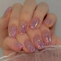 Pink glossy reusable press-on nails by Nailed It
