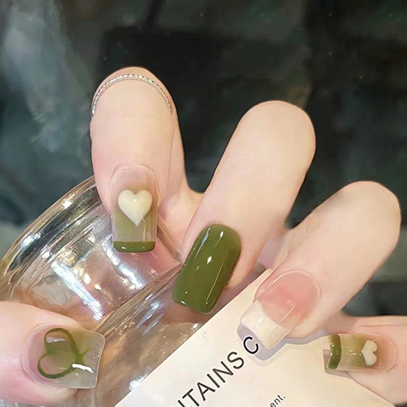 green heart reusable press-on nails by Nailed It
