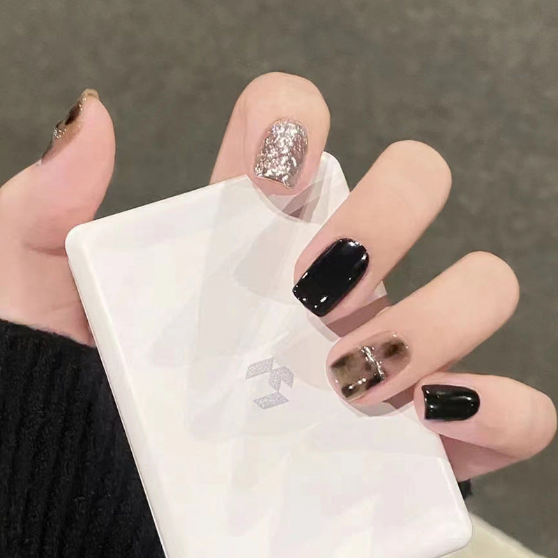 Black / silver mix-style glossy reusable press-on nails by Nailed It
